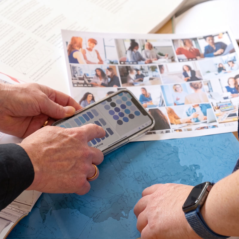 Close-up of a digital infrastructure audit being performed on a mobile device for a client.